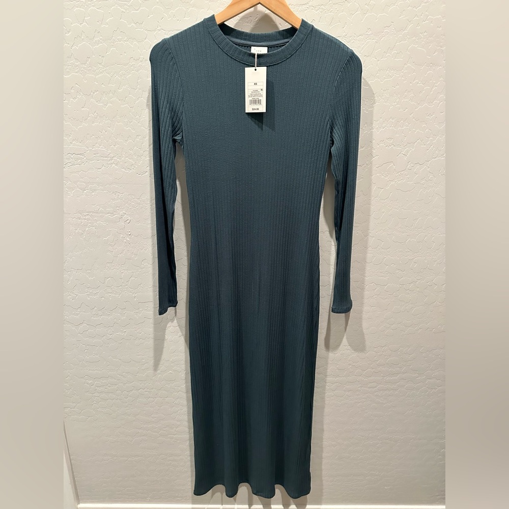 Brand new, dark teal green stretchy dress.